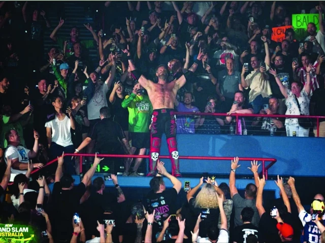 cope fka edge poses with the fans at aew grand slam australia photo publicity