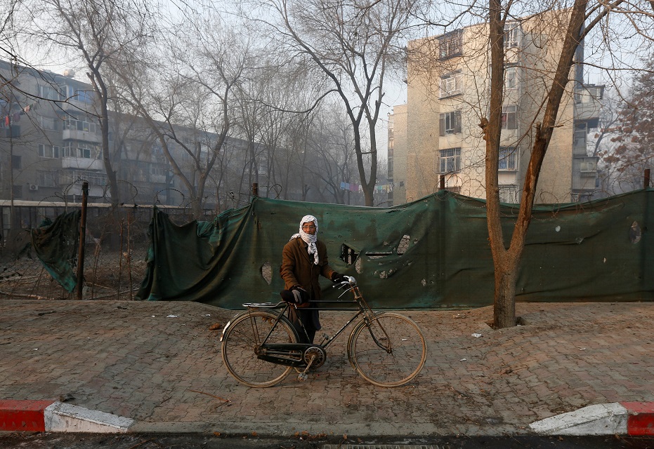 an afghan man walks past the site of a suicide attack in kabul afghanistan january 5 2018 photo reuters