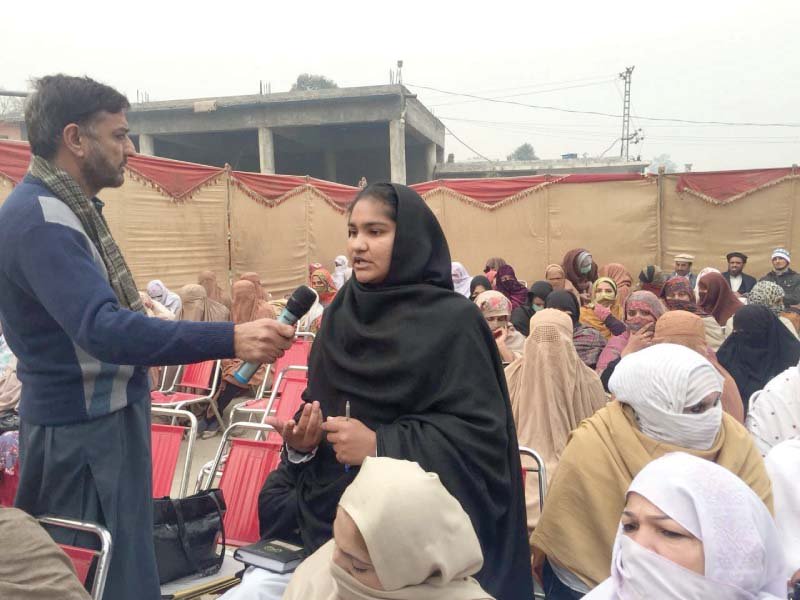 a woman speaks during the public hearing khuli katchery held in charsadda photo express