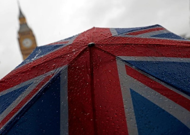 a union flag umbrella is seen in front of the elizabeth tower commonly known as big ben in london britain august 9 2017 photo reuters