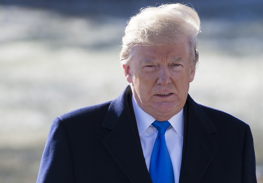 us president donald trump walks to marine one prior to departing from the south lawn of the white house in washington dc january 5 2018 as he travels for a weekend with republican lawmakers at camp david in maryland photo afp