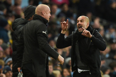 guardiola apologises for touchline row