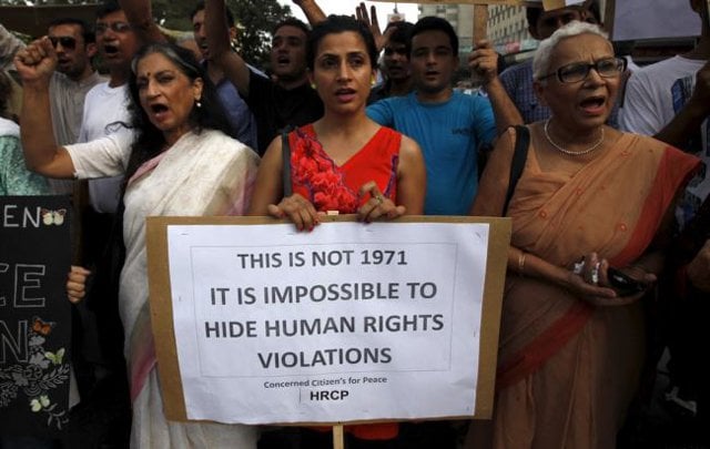 people chant slogans during a protest demanding justice for sabeen mahmud a human rights activist who was shot by gunmen outside the press club in karachi pakistan april 30 2015 the killing raised fears for the safety of dissenting voices photo reuters