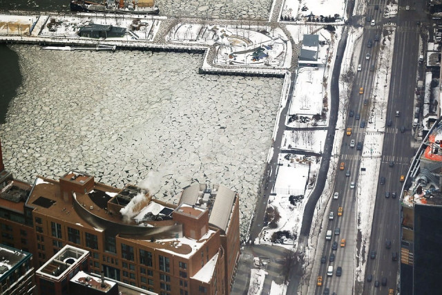 a frozen section of the hudson river sits below the one world observatory on january 8 2018 in new york city following a week of snow and record breaking cold new york city and much of the east coast got some relief today with temperatures rising to the upper 30 039 s photo afp a frozen section of the hudson river sits below the one world observatory on january 8 2018 in new york city following a week of snow and record breaking cold new york city and much of the east coast got some relief today with temperatures rising to the upper 30 039 s photo afp