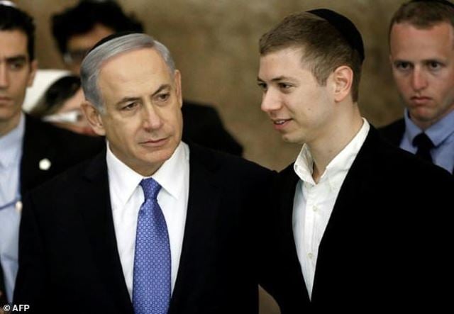 israeli prime minister benjamin netanyahu and his son yair r visit the wailing wall in jerusalem photo afp