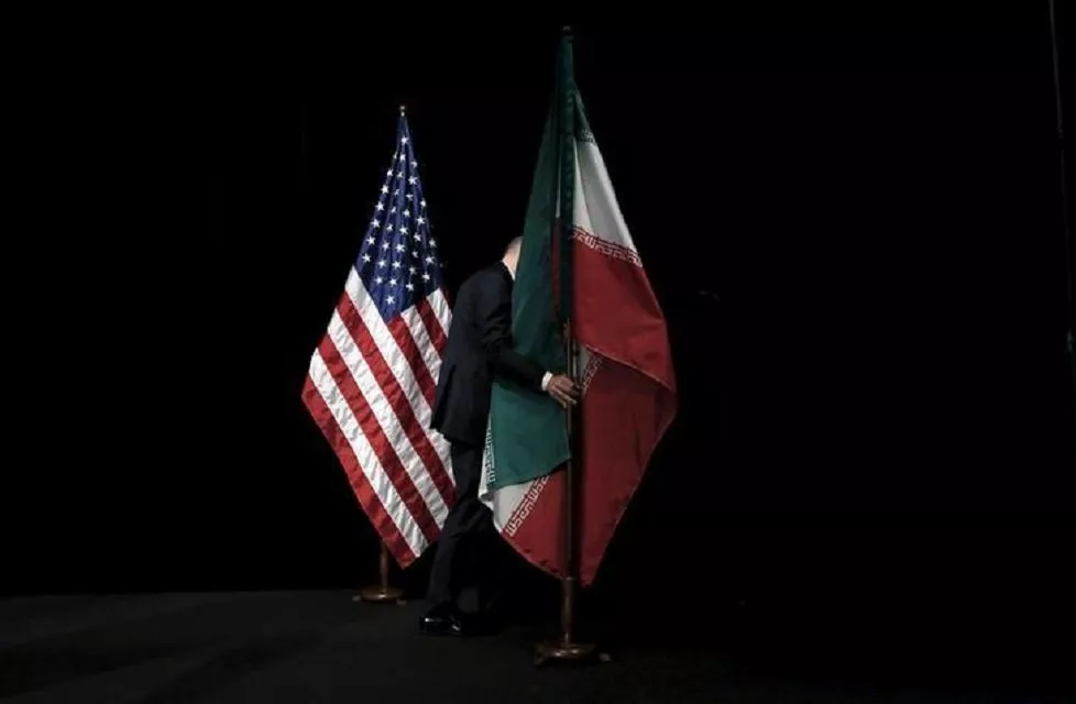 a staff member removes the iranian flag from the stage after a group picture with foreign ministers and representatives of the us iran china russia britain germany france and the european union during the iran nuclear talks at the vienna international center in vienna austria july 14 2015 photo reuters a staff member removes the iranian flag from the stage after a group picture with foreign ministers and representatives of the us iran china russia britain germany france and the european union during the iran nuclear talks at the vienna international center in vienna austria july 14 2015 photo reuters