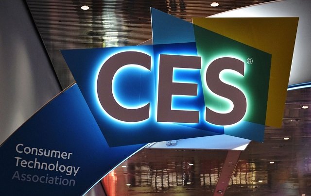 an illuminated ces sign is seen inside of the las vegas convention center ahead of the opening of the 2018 consumer electronics show in las vegas on january 6 2018 the 2018 ces runs from january 9 12 photo afp