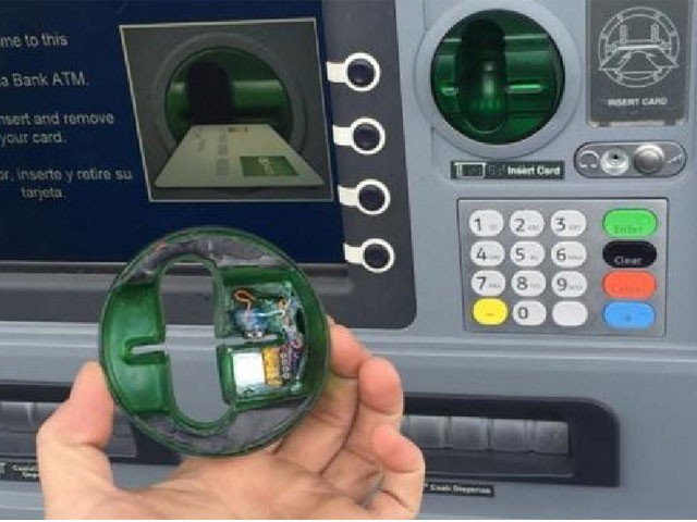 a month back chinese nationals were caught placing scamming devices on atms at a shopping centre in cctv footage in karachi photo express