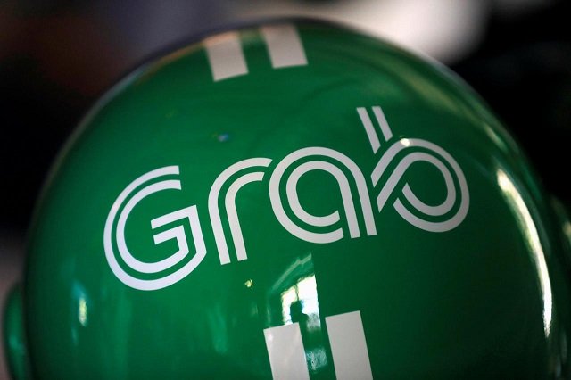 a grab motorbike helmet is displayed during grab 039 s fifth anniversary news conference in singapore june 6 2017 photo reuters