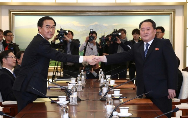 north korean leader ri son gwon shakes hands with his south korean counterpart cho myoung gyon during their meeting on the south korean side of the demilitarized zone separating the two koreas photo reuters