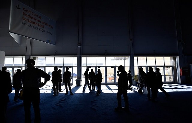 attendees stand around after the power went out during ces 2018 inside the central hall at the las vegas convention center on january 10 2018 in las vegas nevada photo afp