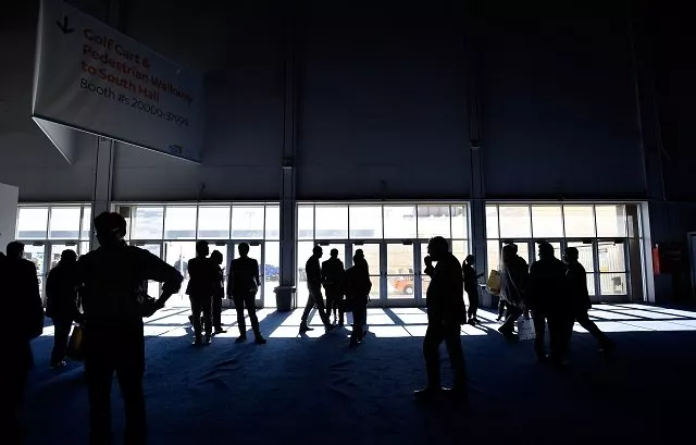 attendees stand around after the power went out during ces 2018 inside the central hall at the las vegas convention center on january 10 2018 in las vegas nevada photo afp attendees stand around after the power went out during ces 2018 inside the central hall at the las vegas convention center on january 10 2018 in las vegas nevada photo afp
