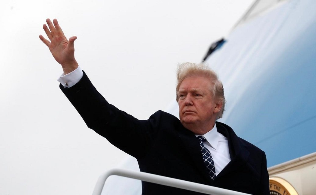 us president donald trump waves as he boards air force one upon departure from joint base andrews in maryland us january 12 2018 photo reuters