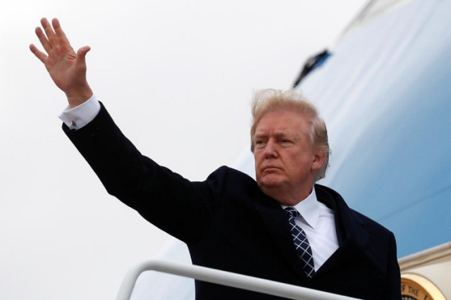 us president donald trump waves as he boards air force one upon departure from joint base andrews in maryland photo reuters