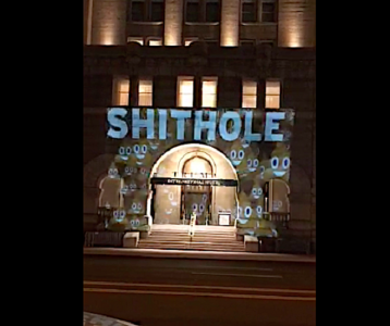shithole projected on trump s hotel in washington