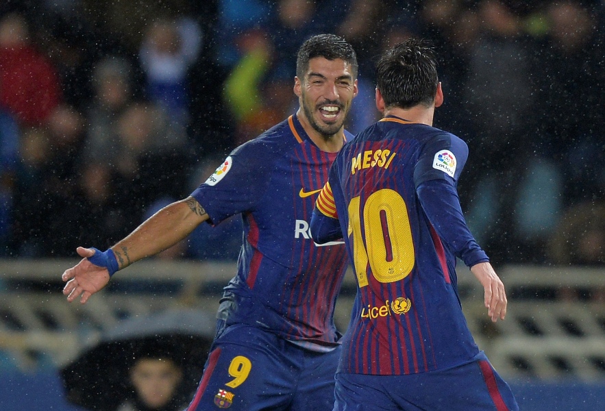 barcelona 039 s lionel messi celebrates with luis suarez after scoring their fourth goal on january 14 2018 photo afp