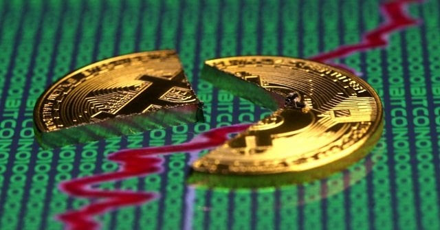 broken representation of the bitcoin virtual currency placed on a monitor that displays stock graph and binary codes are seen in this illustration picture december 21 2017 photo reuters broken representation of the bitcoin virtual currency placed on a monitor that displays stock graph and binary codes are seen in this illustration picture december 21 2017 photo reuters