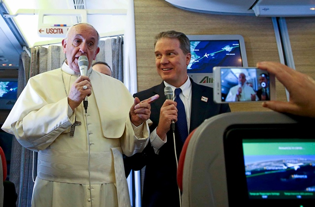 pope francis addresses journalists aboard the plane for his trip to chile and peru on january 15 2018 photo afp