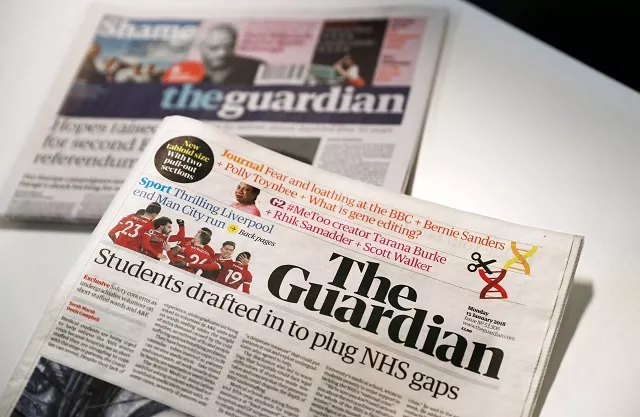 the new look tabloid guardian is on show next to the old broadsheet version of the national newspaper on january 15 2018 photo afp the new look tabloid guardian is on show next to the old broadsheet version of the national newspaper on january 15 2018 photo afp
