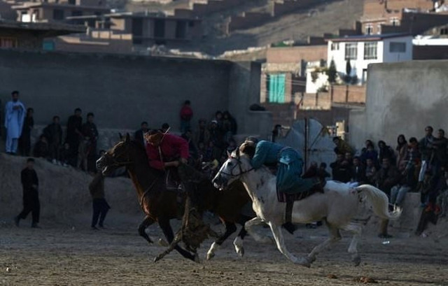 buzkashi involves ripping a 50 kilogramme carcass from the fray of horses and dropping it in the quot circle of justice quot traced on the ground in lime after doing a lap of the field at a full gallop photo afp buzkashi involves ripping a 50 kilogramme carcass from the fray of horses and dropping it in the quot circle of justice quot traced on the ground in lime after doing a lap of the field at a full gallop photo afp