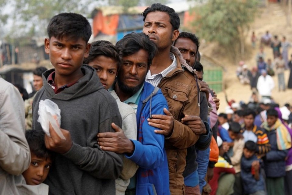 rohingya refugees line up for daily essentials distribution at balukhali camp near cox 039 s bazar bangladesh january 15 2018 photo reuters