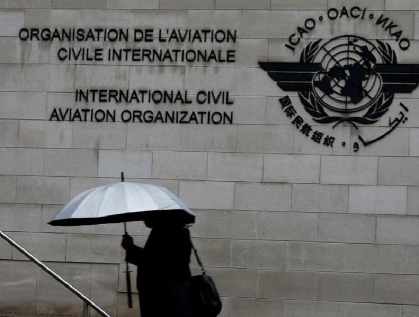 a pedestrian walks past the international civil aviation organization icao headquarters building in montreal quebec canada june 16 2017 photo reuters