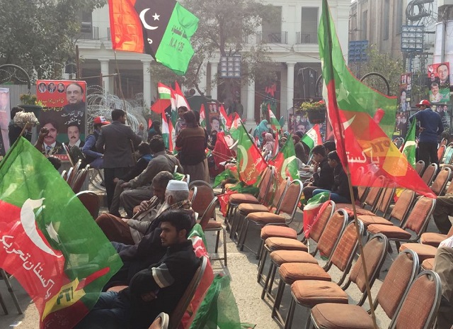 workers of ppp pti and pat start arriving at the mall to attend a protest rally in lahore on wednesday photo express