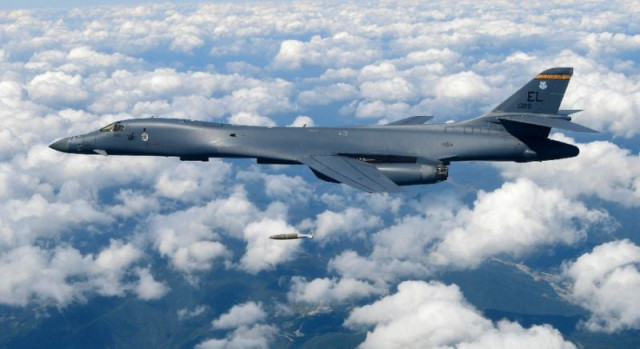us air force b 1b lancer dropping a bomb during an exercise over south korea last year photo afp us air force b 1b lancer dropping a bomb during an exercise over south korea last year photo afp