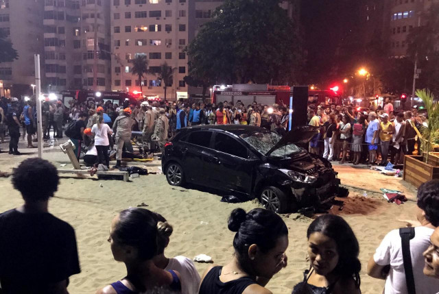 a vehicle that ran over some people at copacabana beach is seen in rio de janeiro brazil january 18 2018 photo reuters a vehicle that ran over some people at copacabana beach is seen in rio de janeiro brazil january 18 2018 photo reuters