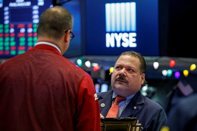 traders work on the floor of the new york stock exchange nyse in new york us january 8 2018 photo reuters