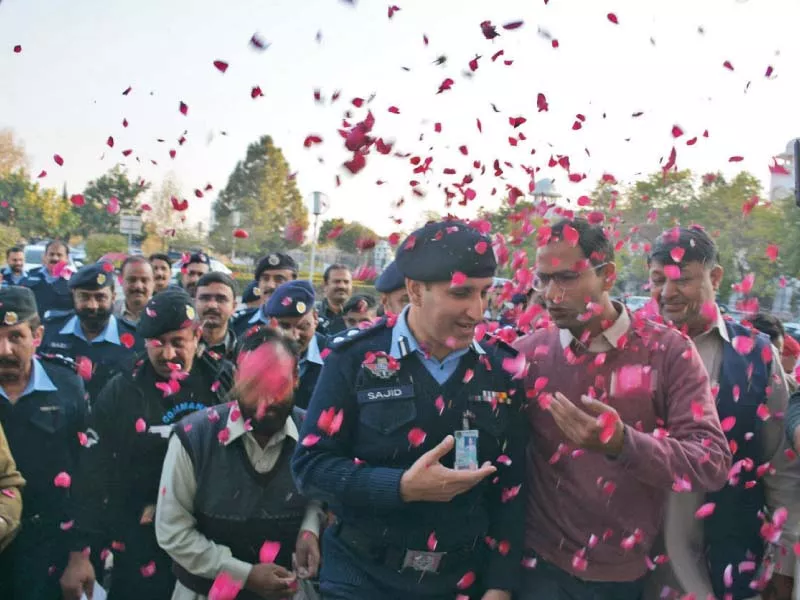 outgoing ssp operations sajid kiani is showered with flowers on his last day photo express outgoing ssp operations sajid kiani is showered with flowers on his last day photo express