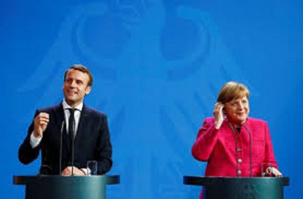 french president emmanuel macron and german chancellor angela merkel photo reuters