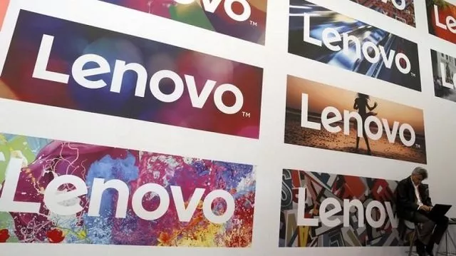 a man uses his laptop next to lenovo 039 s logos during the mobile world congress in barcelona spain february 25 2016 photo reuters a man uses his laptop next to lenovo 039 s logos during the mobile world congress in barcelona spain february 25 2016 photo reuters