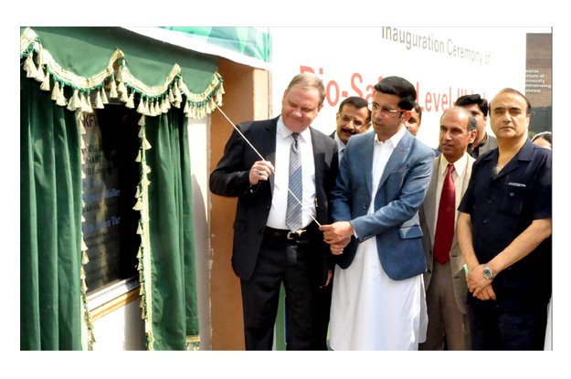 minister for health shahram tarakai inaugurating the lab at hayatabad medical complex photo express