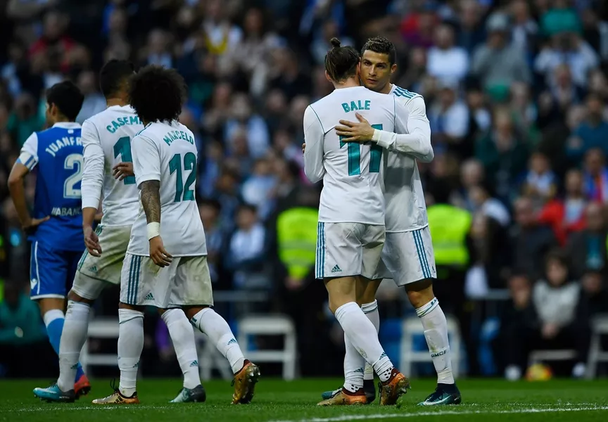 real madrid 039 s portuguese forward cristiano ronaldo r celebrates with real madrid 039 s welsh forward gareth bale during the spanish league football match between real madrid cf and rc deportivo de la coruna at the santiago bernabeu stadium in madrid on january 21 2018 photo afp real madrid 039 s portuguese forward cristiano ronaldo r celebrates with real madrid 039 s welsh forward gareth bale during the spanish league football match between real madrid cf and rc deportivo de la coruna at the santiago bernabeu stadium in madrid on january 21 2018 photo afp