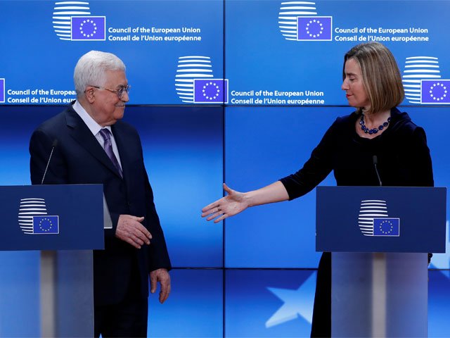 european high representative for foreign affairs federica mogherini shakes hands with palestinian president mahmoud abbas in brussels belgium photo reuters