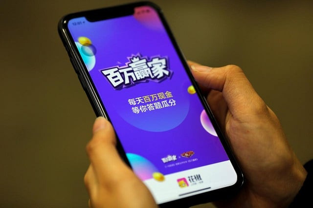 quot baiwan yingjia quot or quot millions winner quot an online quiz game by live streaming app huajiao is seen on a mobile phone in this illustration picture taken january 22 2018 photo reuters quot baiwan yingjia quot or quot millions winner quot an online quiz game by live streaming app huajiao is seen on a mobile phone in this illustration picture taken january 22 2018 photo reuters