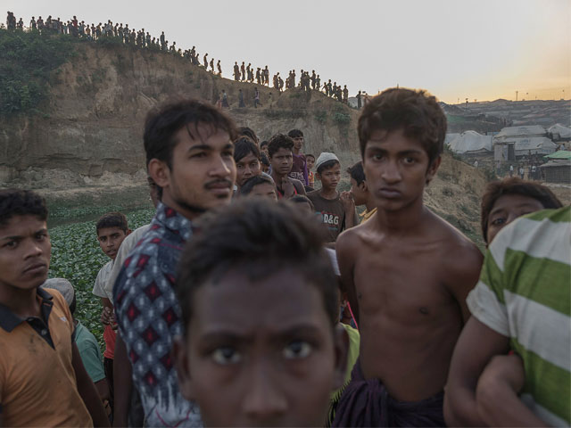 rohingya muslim refugees looking on near kutupalong refugee camp in cox 039 s bazar photo afp file