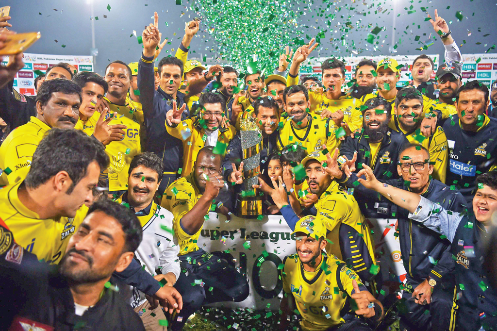 jubilant peshawar zalmi players pose with psl trophy in lahore photo afp