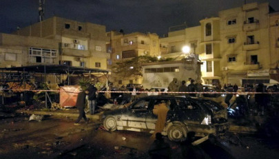 twin car bombs kill at least 22 in libya s benghazi twin car bombs kill at least 22 in libya s benghazi