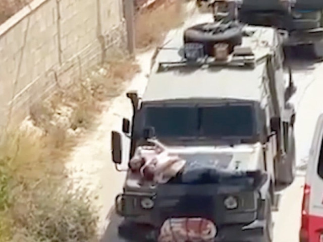 israeli army troops strap palestinian on military jeep during a raid in jenin in this screengrab from a video in the israeli occupied west bank photo reuters israeli army troops strap palestinian on military jeep during a raid in jenin in this screengrab from a video in the israeli occupied west bank photo reuters