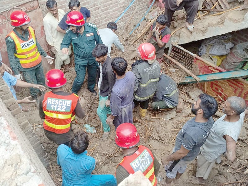 rescue 1122 officials rescue people trapped under debris following a roof collapse in sheikhupura photo nni