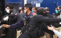 nine cops injured in clash with truckers