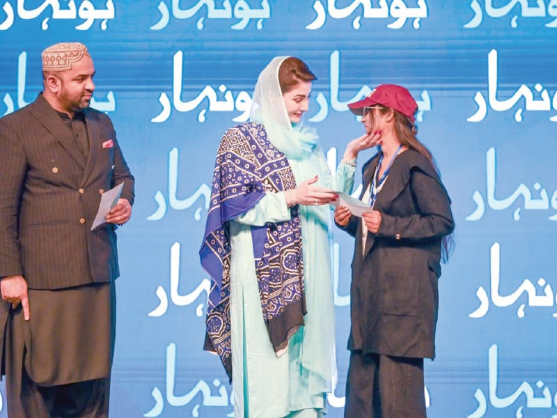 punjab cm maryam nawaz hands over a honhar scholarship cheque to a student at bahauddin zakariya university in multan photo express