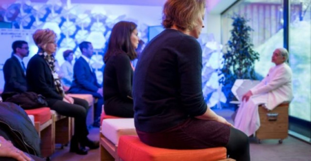 morning meditation is helping to leaven the usual corporate and eco political fare at the davos business summit photo afp morning meditation is helping to leaven the usual corporate and eco political fare at the davos business summit photo afp