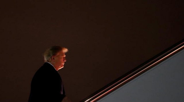 us president donald trump boards air force one for travel to switzerland to attend the world economic forum wef annual meeting in davos from joint base andrews maryland photo reuters us president donald trump boards air force one for travel to switzerland to attend the world economic forum wef annual meeting in davos from joint base andrews maryland photo reuters