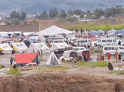 afghan returns resume amid torkham crisis