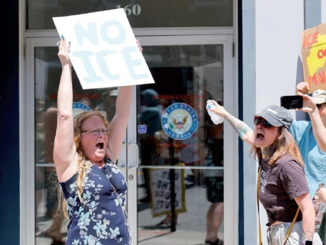 people protest outside the office of us senator susan collins after a shooting involving us ice in biddeford maine photo reuters people protest outside the office of us senator susan collins after a shooting involving us ice in biddeford maine photo reuters