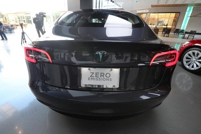 a tesla model 3 is seen in a showroom in los angeles california us january 12 2018 photo reuters a tesla model 3 is seen in a showroom in los angeles california us january 12 2018 photo reuters