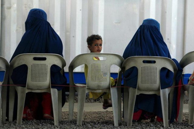 afghan refugees are seen at unhcr s voluntary repatriation centre in peshawar pakistan photo reuters afghan refugees are seen at unhcr s voluntary repatriation centre in peshawar pakistan photo reuters
